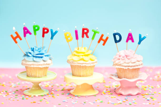 Text happy birthday inmidst colorful confetti and a rose