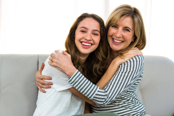 istock Mother and daughter smiling together 675653266