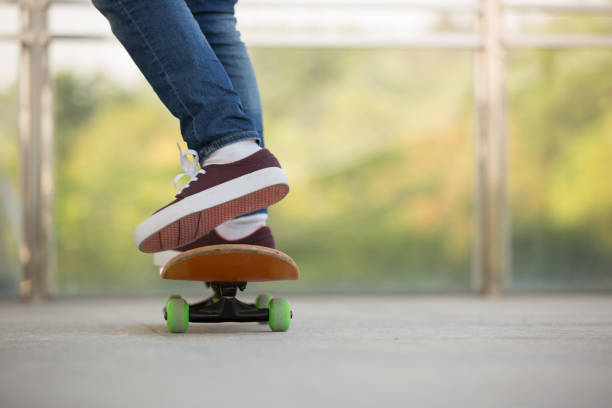 istock skateboarder legs skateboarding at skatepark 675673676