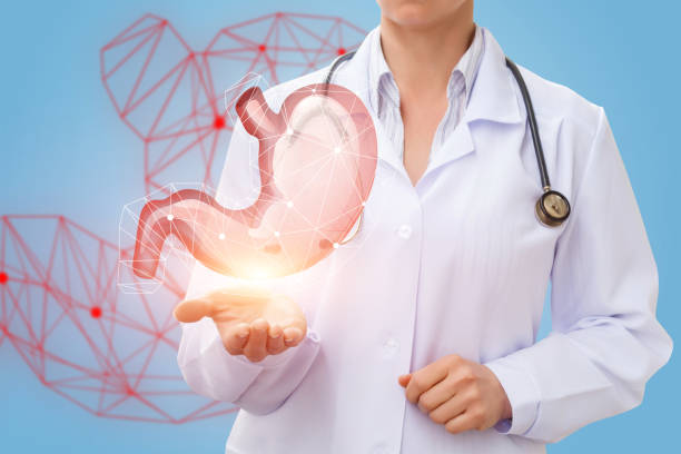 istock The doctor shows the stomach. 675674406