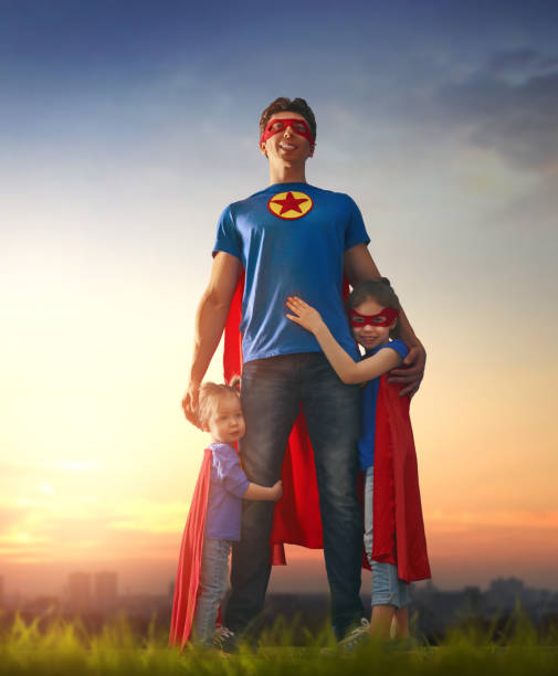 istock Dad and his daughters are playing 675676900