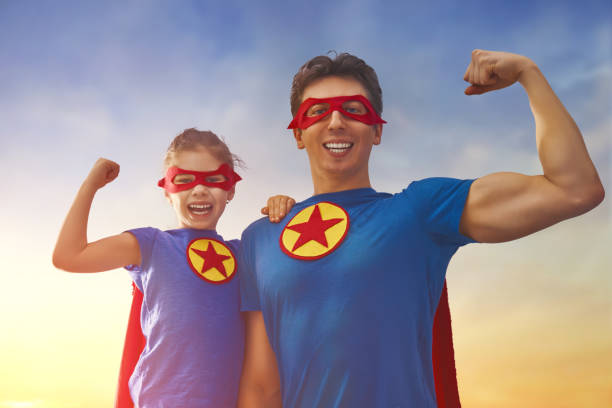 istock Dad and his daughter playing outdoors 675676916