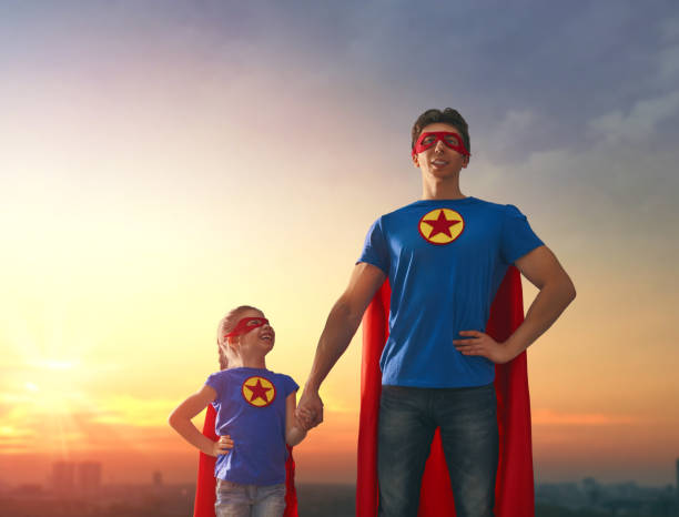 istock Dad and his daughter playing outdoors 675676950