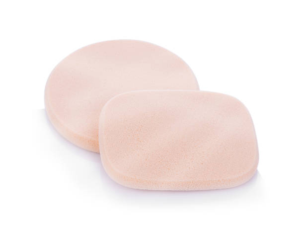 istock Cosmetic sponges on white background 675679922