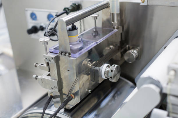 istock metal machine with shafts and control block 675680418