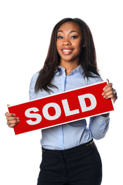 View of sale sign with sold text.