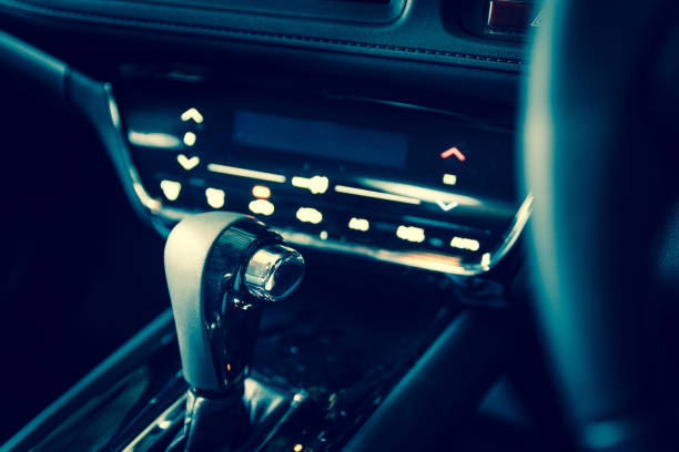 istock Closeup interior modern car console with full windscreen show space of front seat and passenger cabin , gear box , steering wheel and whole of dashboard function. 675684134