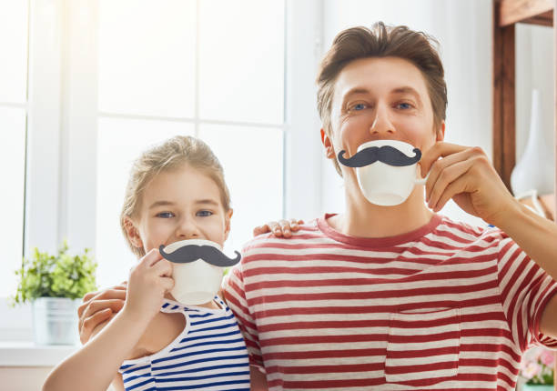 istock father and daughter play 675687980