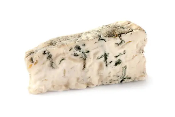 Piece of gorgonzola cheese isolated on white background.