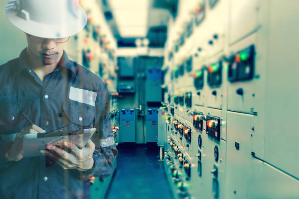 istock Double exposure of  Engineer or Technician man working with tablet in switch gear electrical room of oil and gas platform or plant industrial for monitor process, business and industry concept 675688272