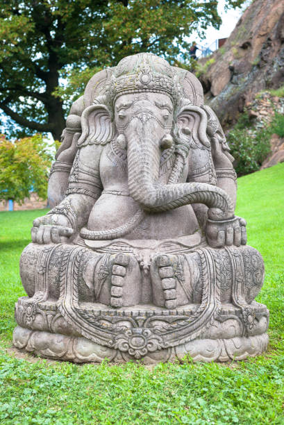 istock Ganesha statue in a beautiful mountain garden 675691402