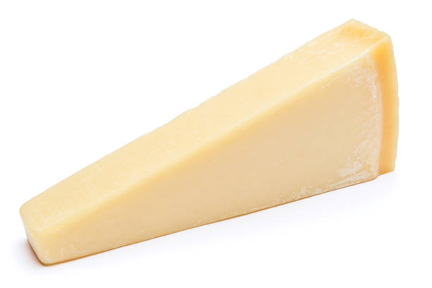 istock Piece of parmesan cheese isolated on white background 675695306