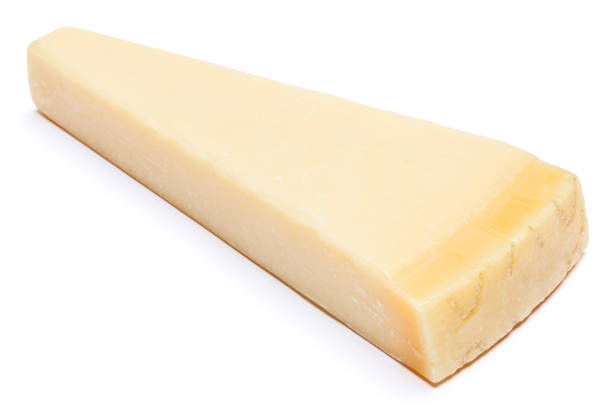 istock Piece of parmesan cheese isolated on white background 675695338