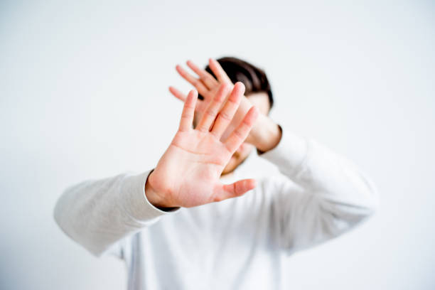 istock Man covering his face 675697758