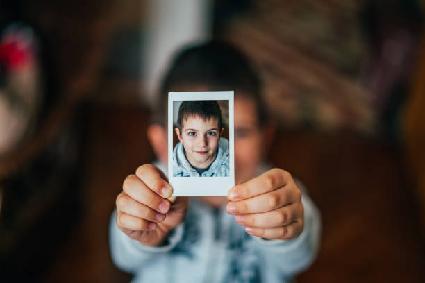 istock Little boy showing selfie to the camera 675700940