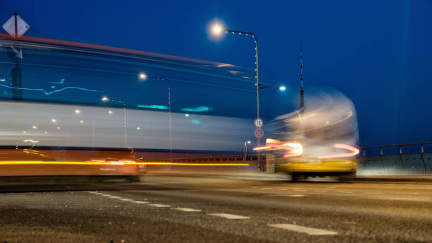 istock Urban night scene. Evening traffic in the streets. 675700990