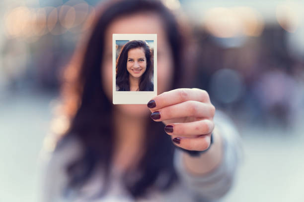 istock Woman showing selfie to the camera 675701012