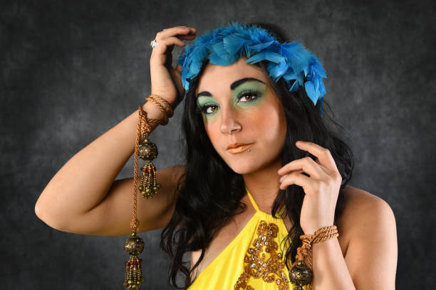 istock Yount Woman Wearing Feather Crown 675727032