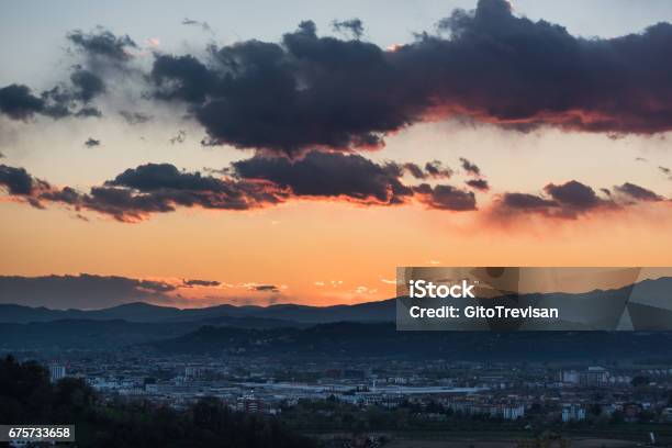 Clouds At Sunset Stock Photo - Download Image Now - Above, Abstract, Atmospheric Mood