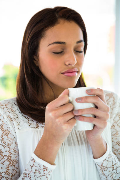 istock Young girl drink her tea 675734232