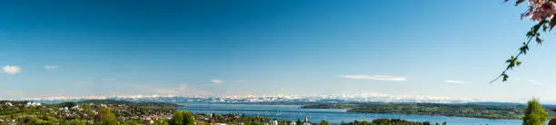 Panoramic View of the Bodensee with Swiss Alps in Background