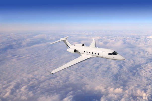 Private business jet airplane flying on a high altitude. stock photo
