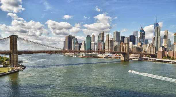 istock Panorama of Brooklyn Bridge at sunny day. 675773814