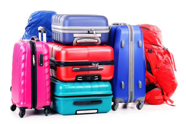 istock Suitcases and rucksacks isolated on white 675779756