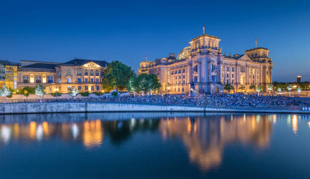 istock Berlin government district with Reichstag and Spree river in twilight, central Berlin Mitte, Germany 675779786