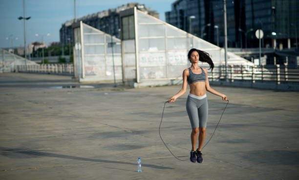istock Woman jumping the rope 675780002