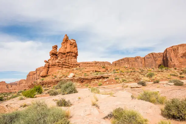 Tall red balancing rocks in Arches National Park in canyons