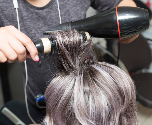 istock Styling female hair dryer 675793598