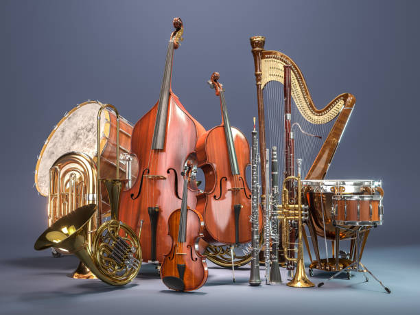 strumenti musicali orchestrali su sfondo grigio. rendering 3d - orchestra foto e immagini stock