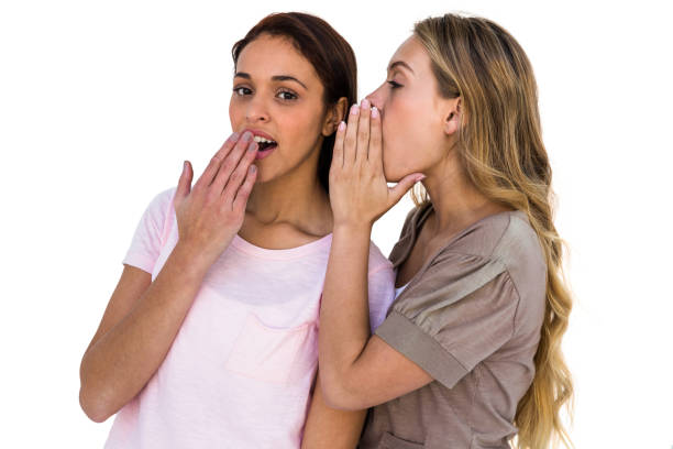 istock Girls whispering 675803184