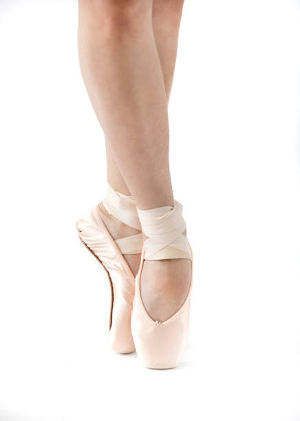 Ballet Pointe Shoes Ballet pointe shoes on white ballet dancer feet stock pictures, royalty-free photos & images