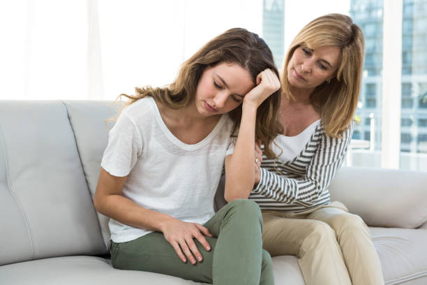istock Sad daughter against mother 675805060