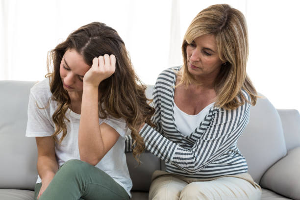 istock Sad daughter against mother 675805098