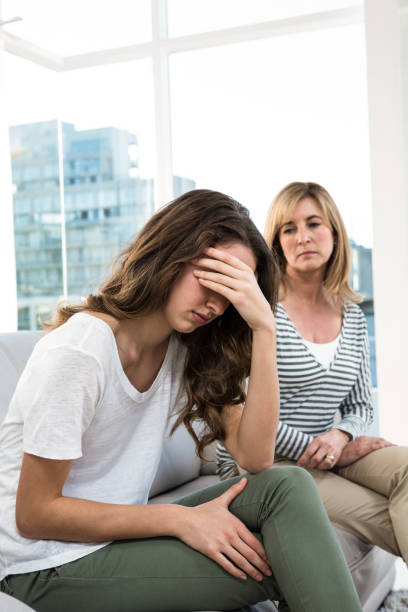 istock Sad daughter against mother 675805190