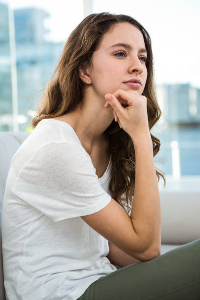 istock Woman thinking with hand on chin 675806148