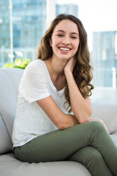 istock Happy woman smiling at the camera 675806534