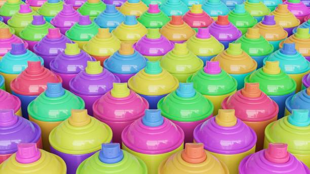 istock Neat Grid of Playfully Randomly Colored Plastic Aerosol Cans 675809424