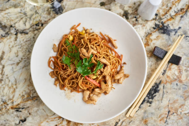 istock Thin noodles with chicken slices 675810284