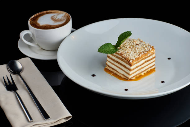 istock Slice of layered honey cake 675811902
