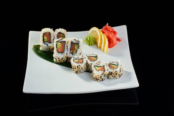 istock Sushi roll with fresh salmon and cucumber 675812242