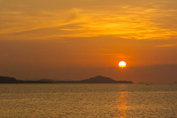 istock beautiful sky and cloud with orange sunset and silhouette mountain 675813944