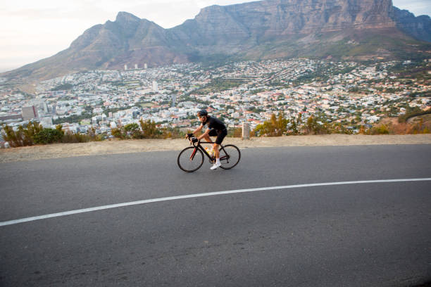 istock Determined male cyclist out on a morning training ride 675815702