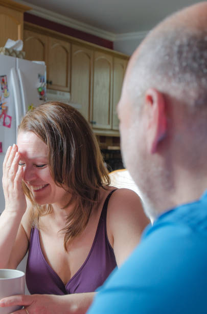 istock Heterosexual couple discussing at table with coffee 675816566