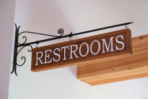istock Restrooms Sign at Wedding Venue 675816930