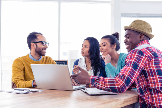 istock Business people discussing on laptop 675817436