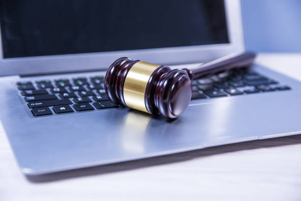 Judge Gavel on Laptop gavel on laptop keyboard e auction stock pictures, royalty-free photos & images
